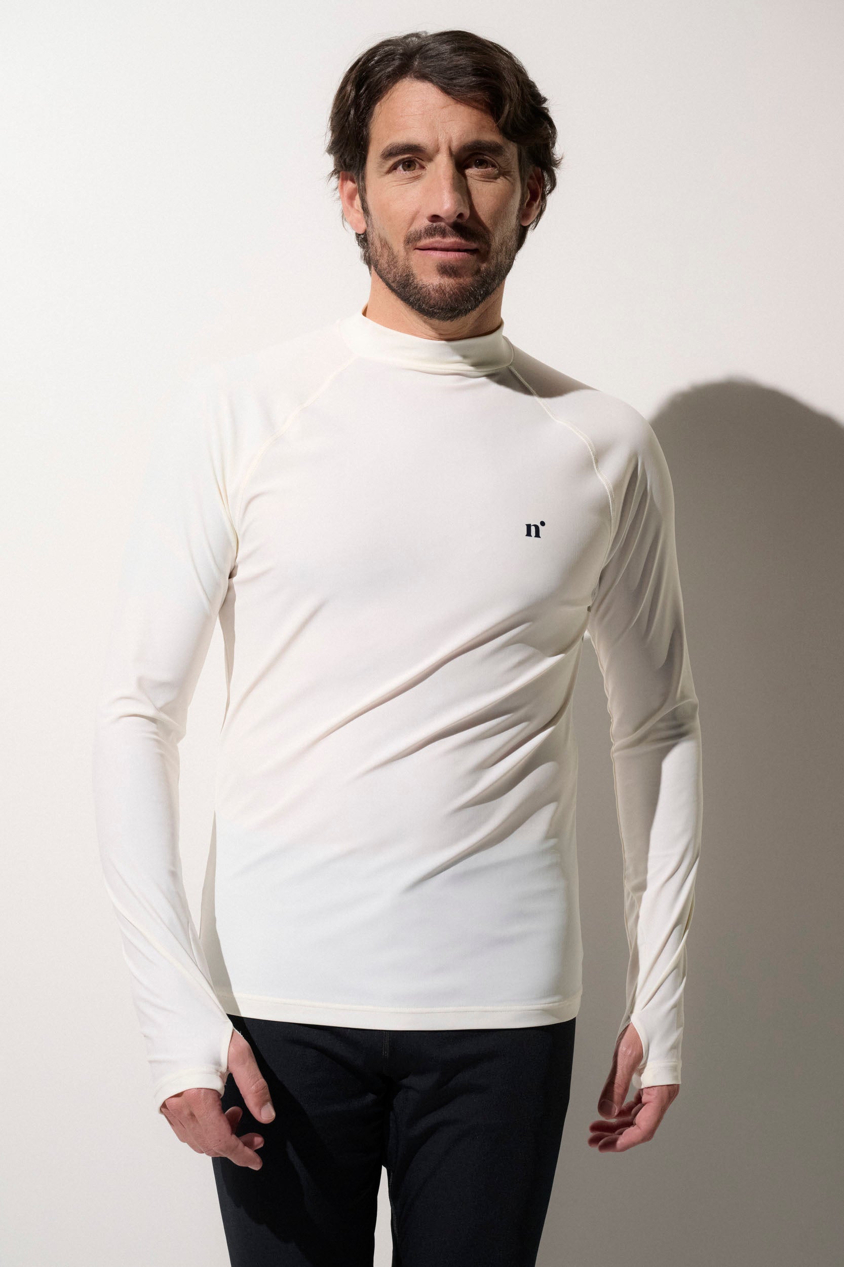 T-shirt de bain anti-UV blanc pour homme, léger, manches longues, UPF 50+, idéal pour les activités aquatiques.