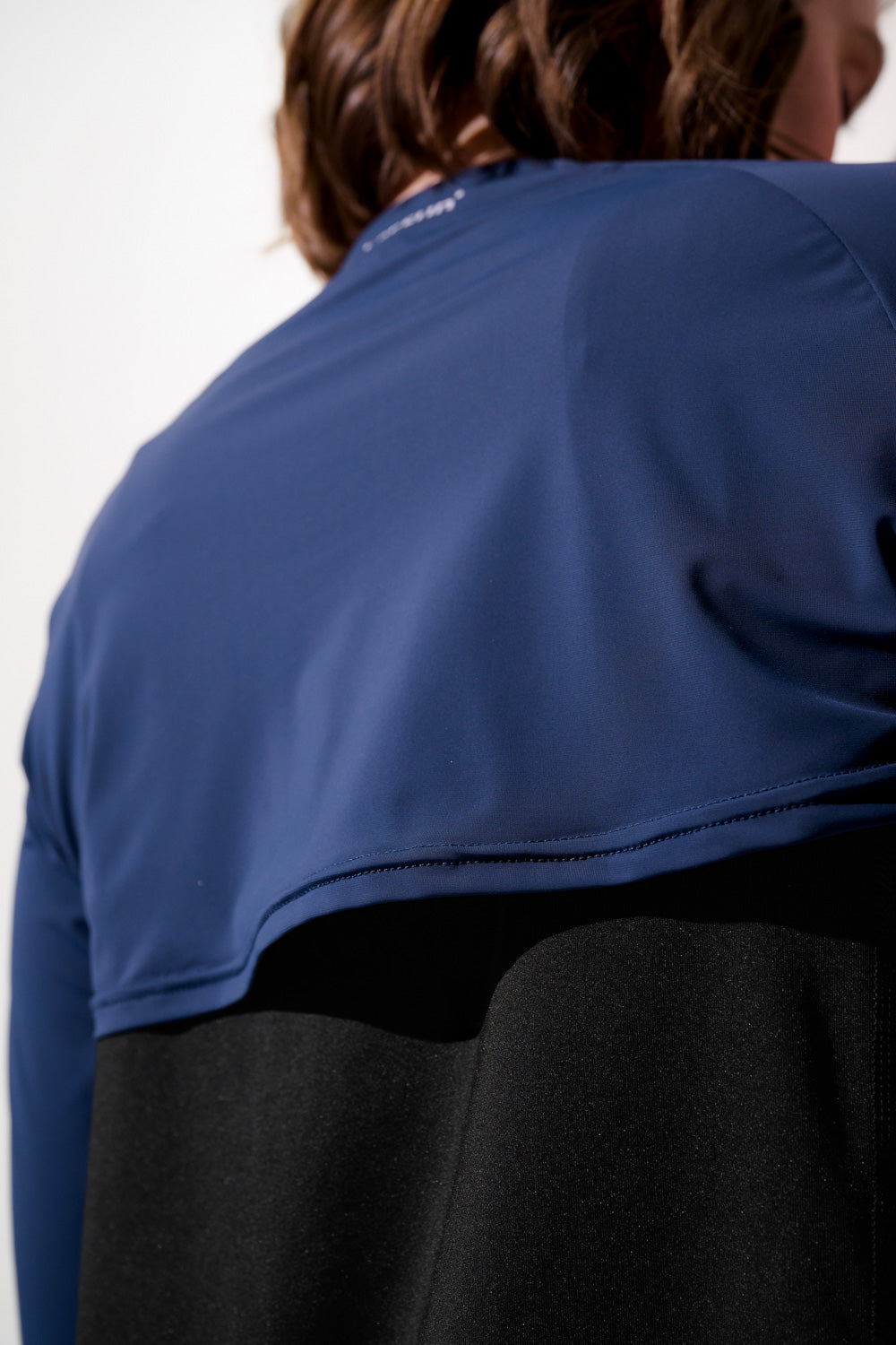 Shrug anti-UV - Sequoia, vêtement léger femme en bleu, offrant une protection solaire UPF 50+ pour activités sportives.