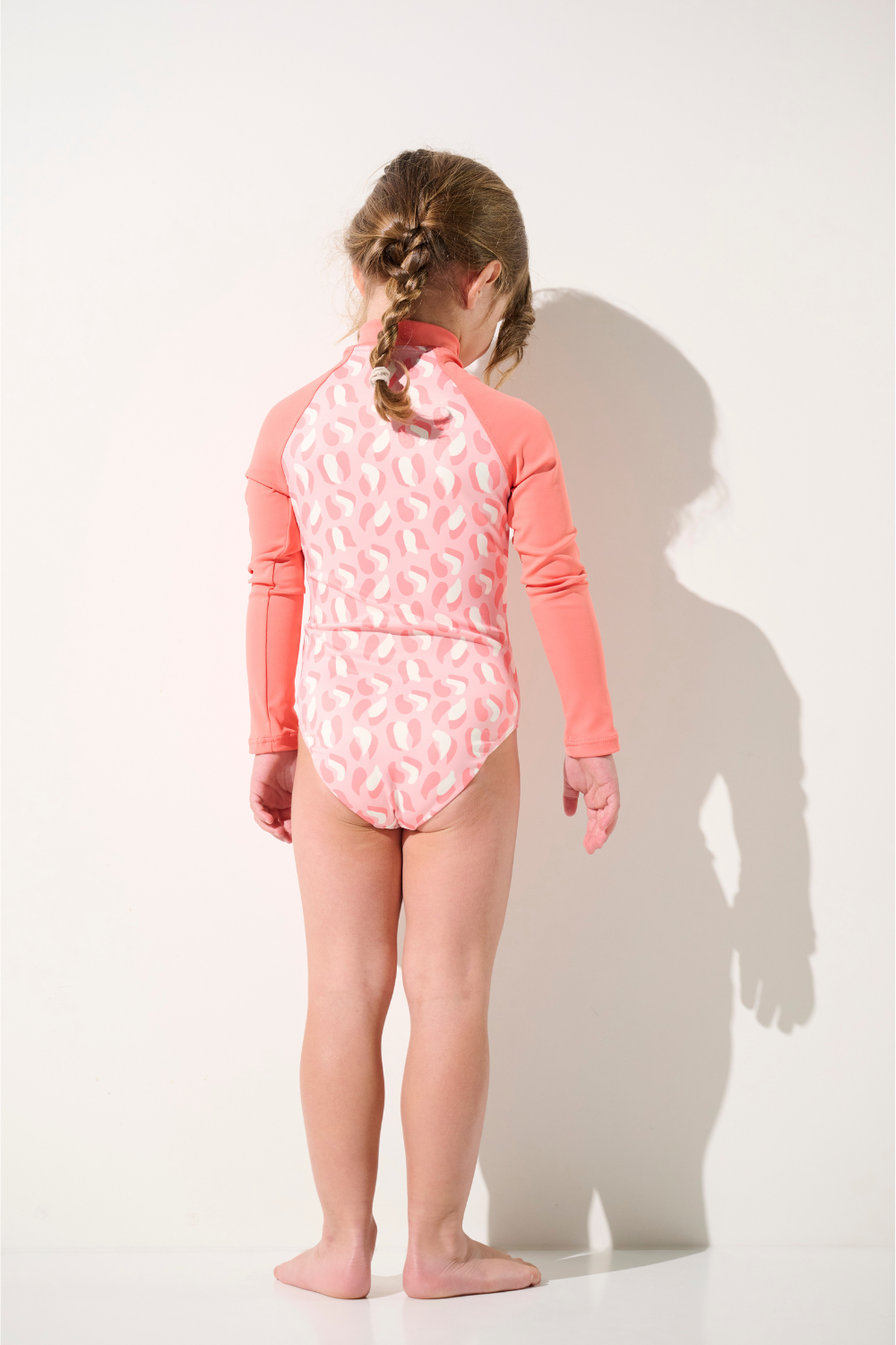 Maillot de bain anti-UV manches longues - Flores pour fille, rose, léger et élégant, offrant protection solaire UPF 50+.