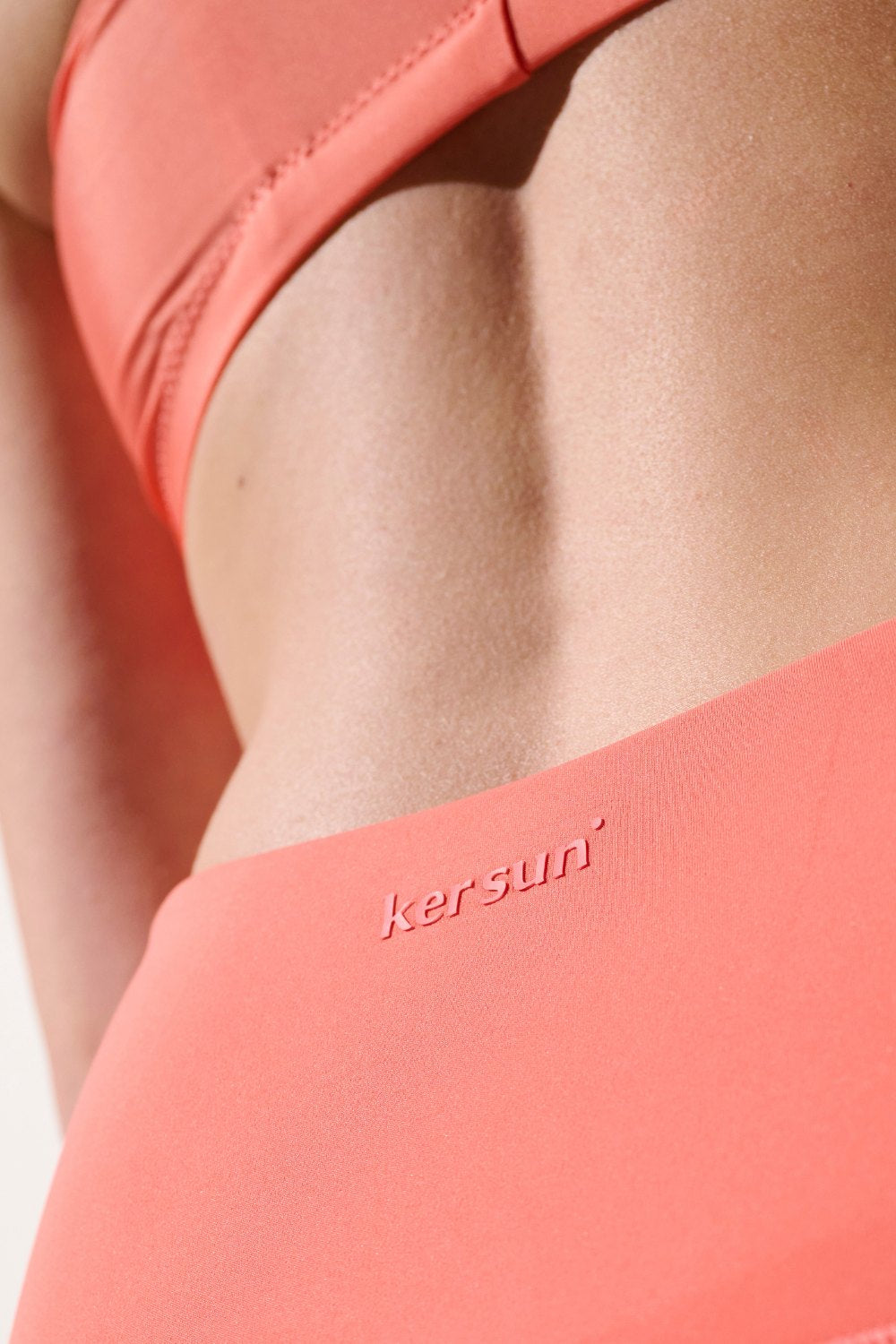 Legging de bain anti-UV - Galápagos corail, léger et respirant pour femme, offrant protection solaire UPF 50+.