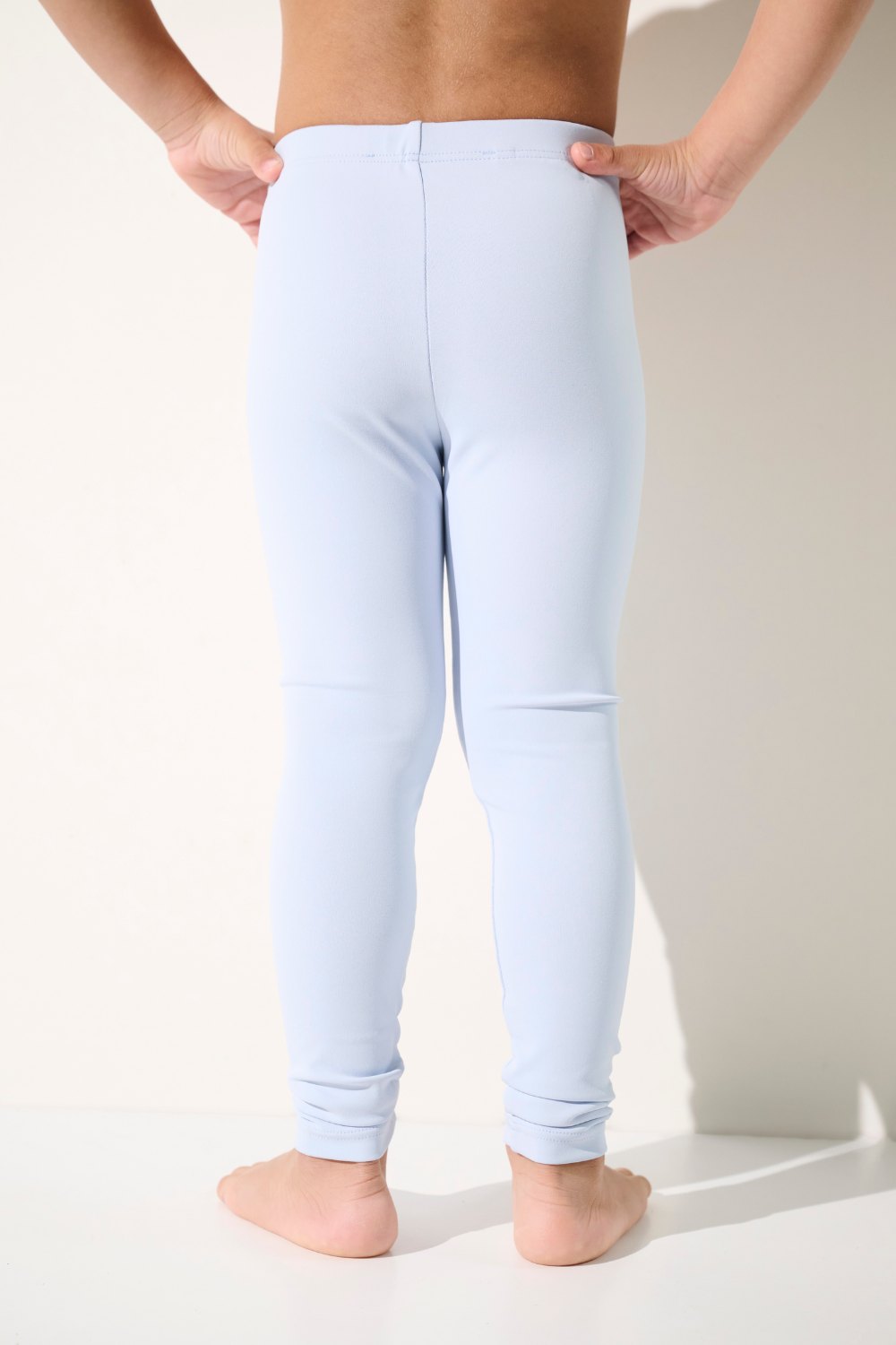 Legging de bain anti-UV Samoa pour enfant, léger et respirant, coloris bleu, offrant une protection solaire UPF 50+.