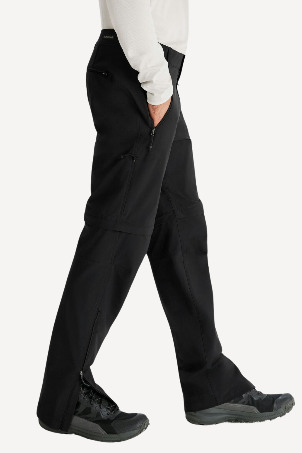 Pantalon anti-UV convertible noir pour homme, léger et extensible, offrant protection solaire UPF 50+.