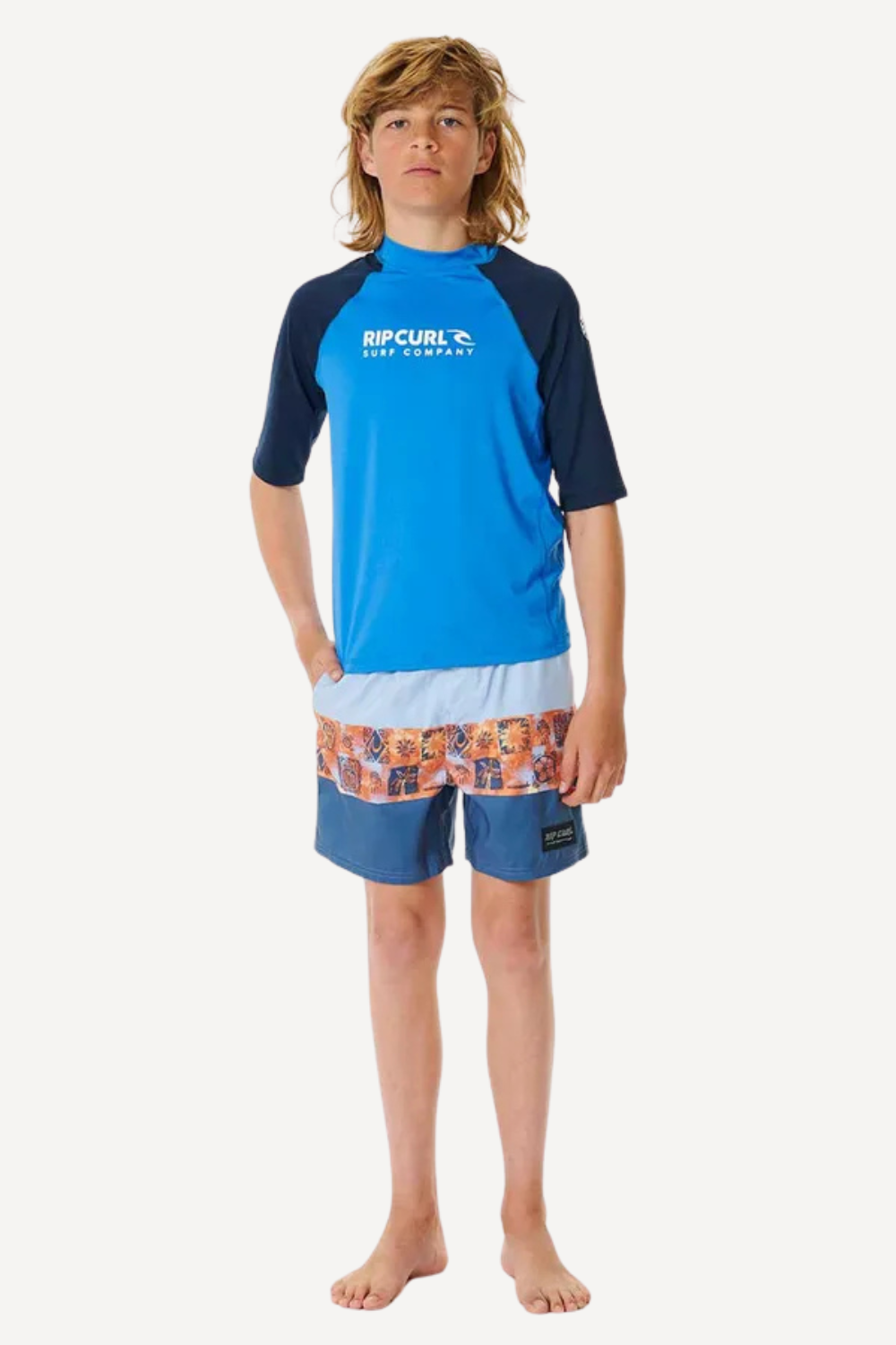 T-shirt de bain anti-UV bleu pour garçon, logo Rip Curl, avec shorts de bain, idéal pour la plage.