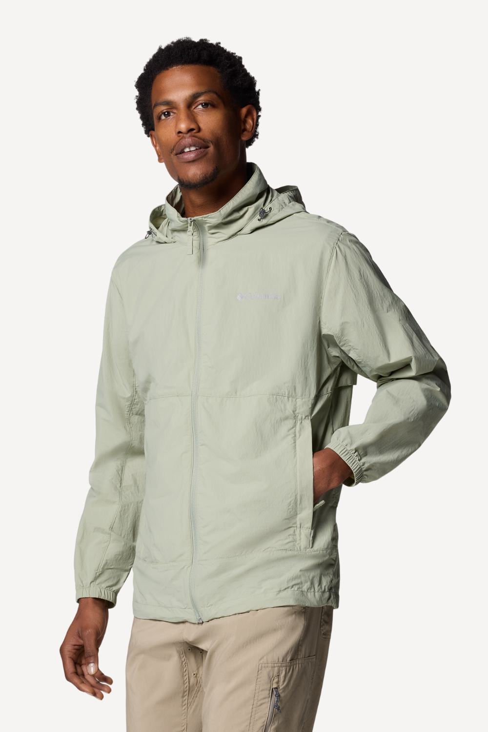 Veste anti-UV verte pour homme, légère et résistante au vent, offrant protection solaire UPF 50+.