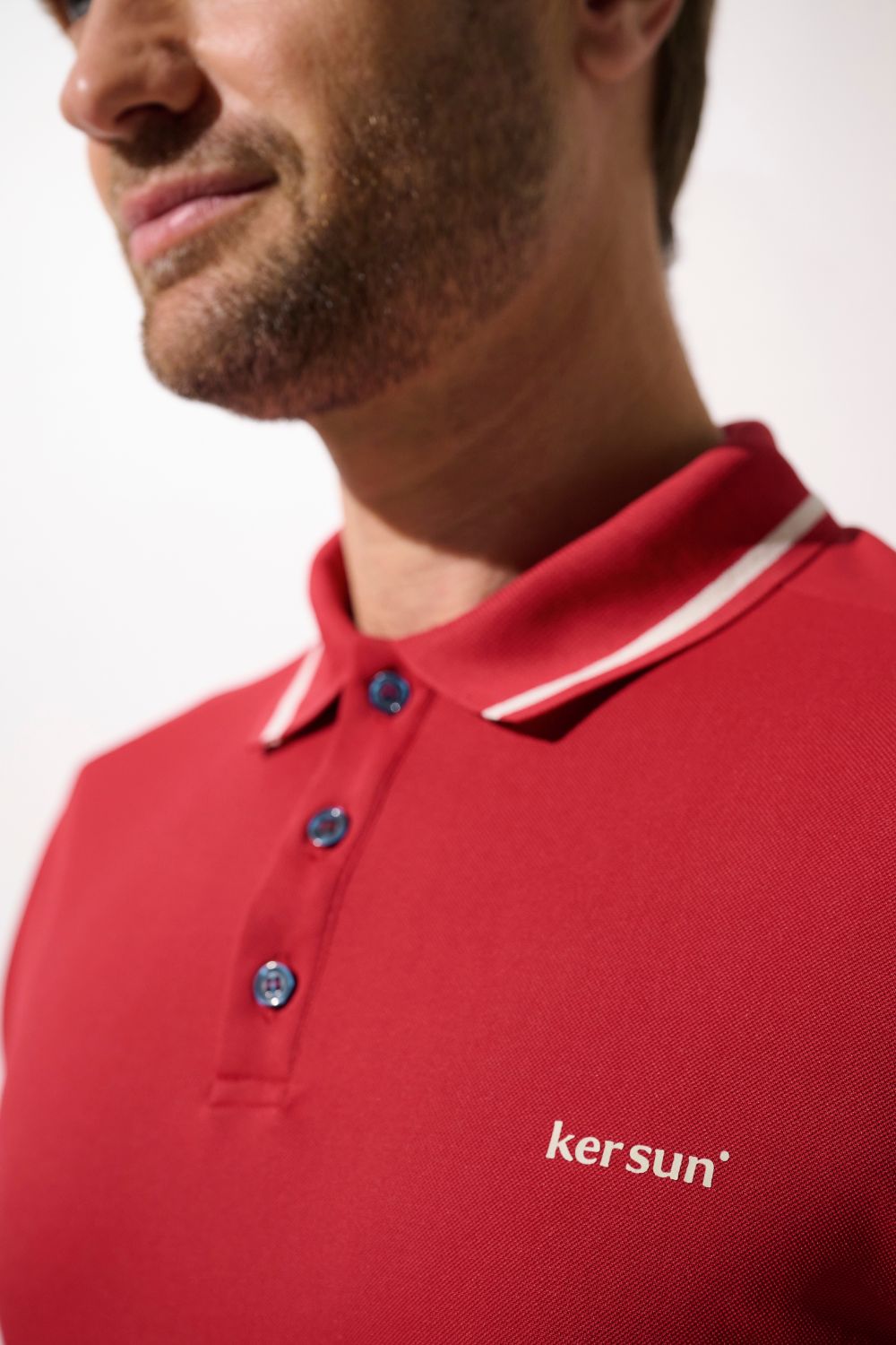 Polo anti-UV Rouge - Augusta pour homme, léger et respirant, idéal pour le sport sous le soleil avec protection UPF 50+.