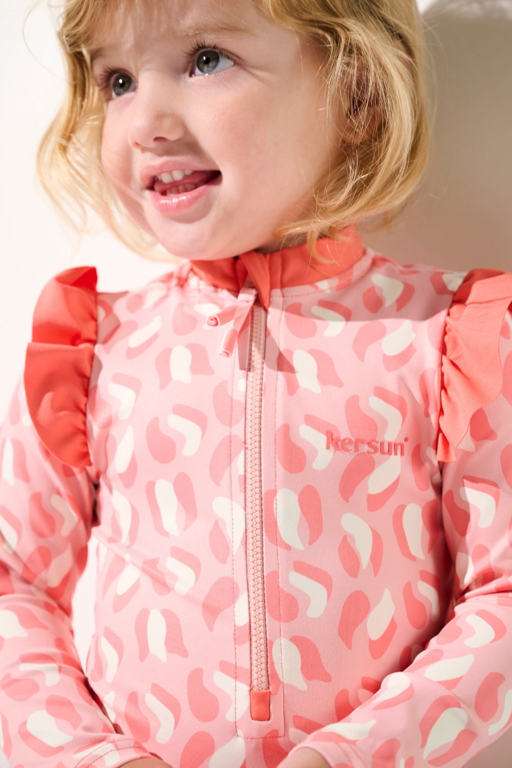 Maillot de bain anti-UV manches longues - Flores, rose à motifs pour enfant, protection solaire UPF 50+.