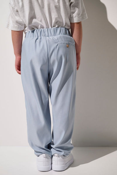 Pantalon anti-UV - Faro bleu clair pour enfant, léger et confortable, offrant une protection solaire UPF 50+.