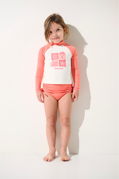 T-shirt de bain anti-UV - Pacific pour enfant, manches longues, léger, UPF 50+, rose, idéal pour les activités aquatiques.