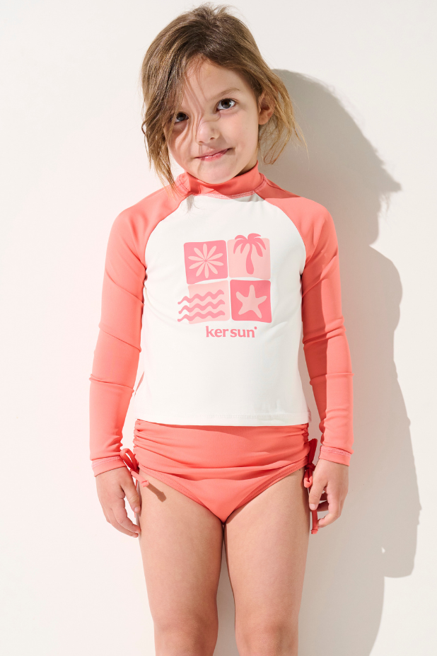 T-shirt de bain anti-UV - Pacific pour enfant, manches longues, léger, UPF 50+, rose, idéal pour les activités aquatiques.