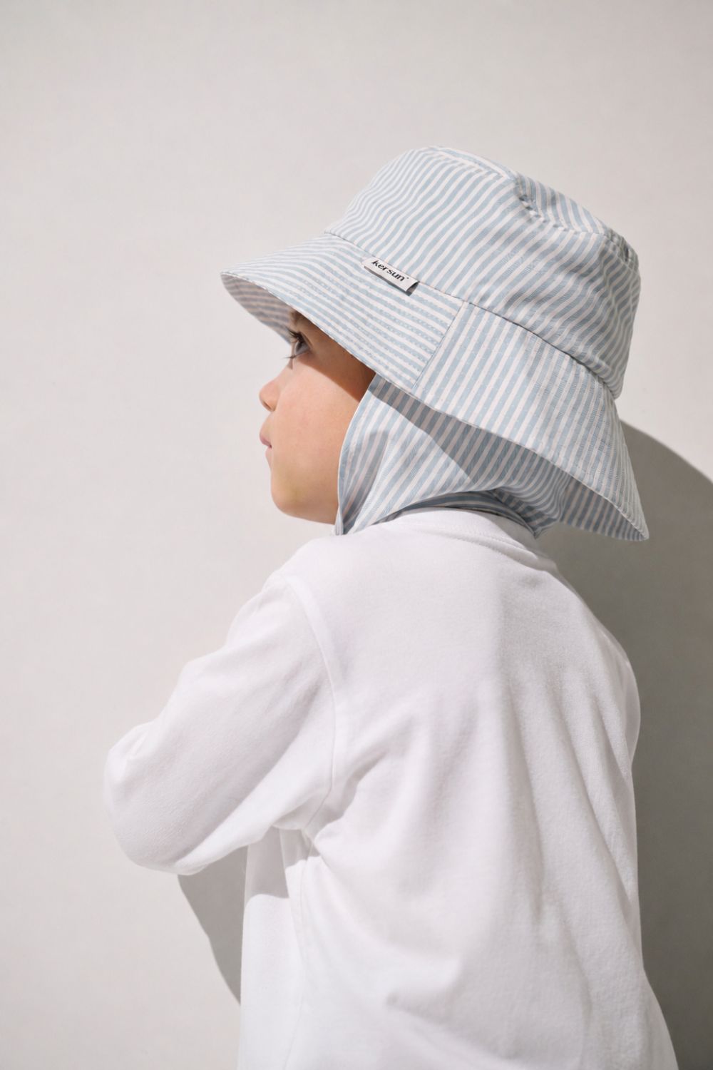 Bob anti-UV - Sylt pour enfant, en rayures bleues, léger et protecteur, idéal contre le soleil.