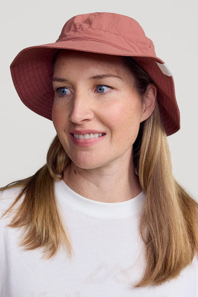 Bob anti-UV - Evry-Day en rose, porté par une femme, offrant protection solaire avec un indice UPF 50+.
