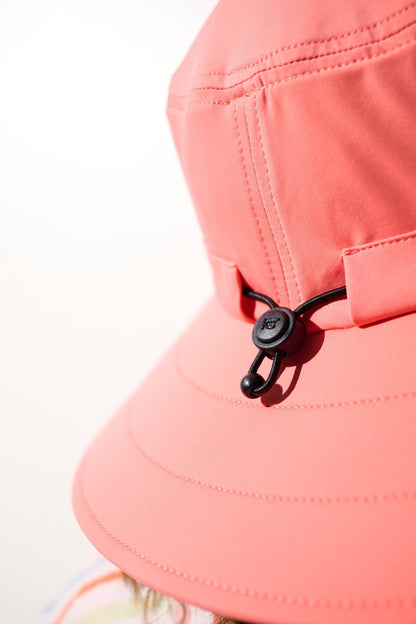 Chapeau de bain anti-UV - Galápagos rose, léger, ajustable, parfait pour protéger du soleil lors d'activités en plein air.