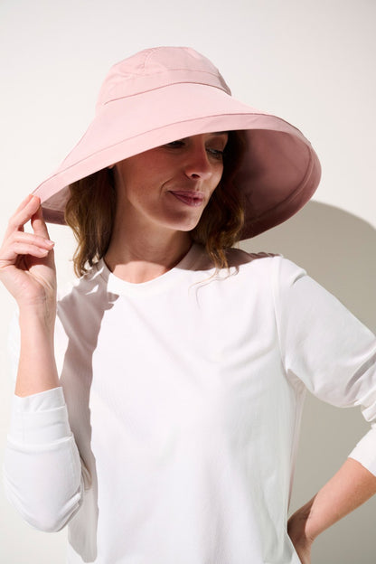 Chapeau anti-UV - Faro, élégant et pratique pour femme, coloris rose, idéal pour activités extérieures et protection solaire.