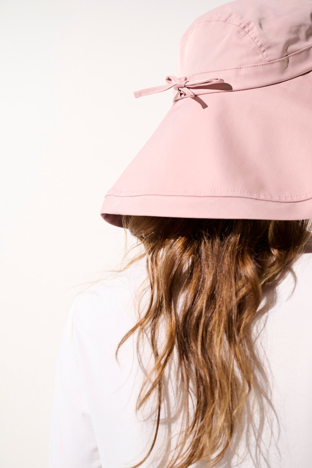 Chapeau anti-UV - Faro rose pour femme, large bord, idéal pour les activités extérieures et protection solaire UPF 50+.
