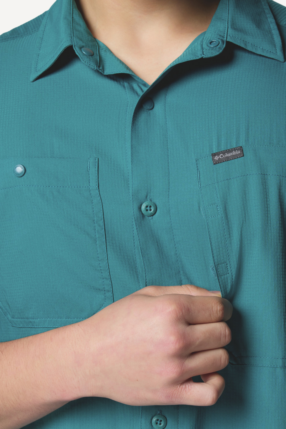 Chemise anti-UV Columbia en teal, légère et confortable, idéale pour la randonnée, certifiée UPF50+.