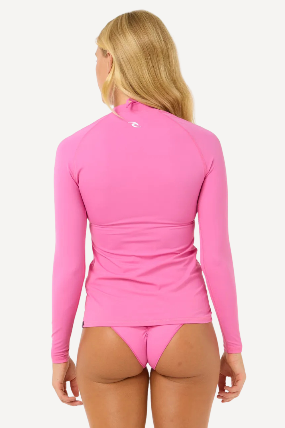 T-shirt de bain anti-UV rose pour femme, UPF 50+, manches longues, idéal pour la plage et les sports aquatiques.