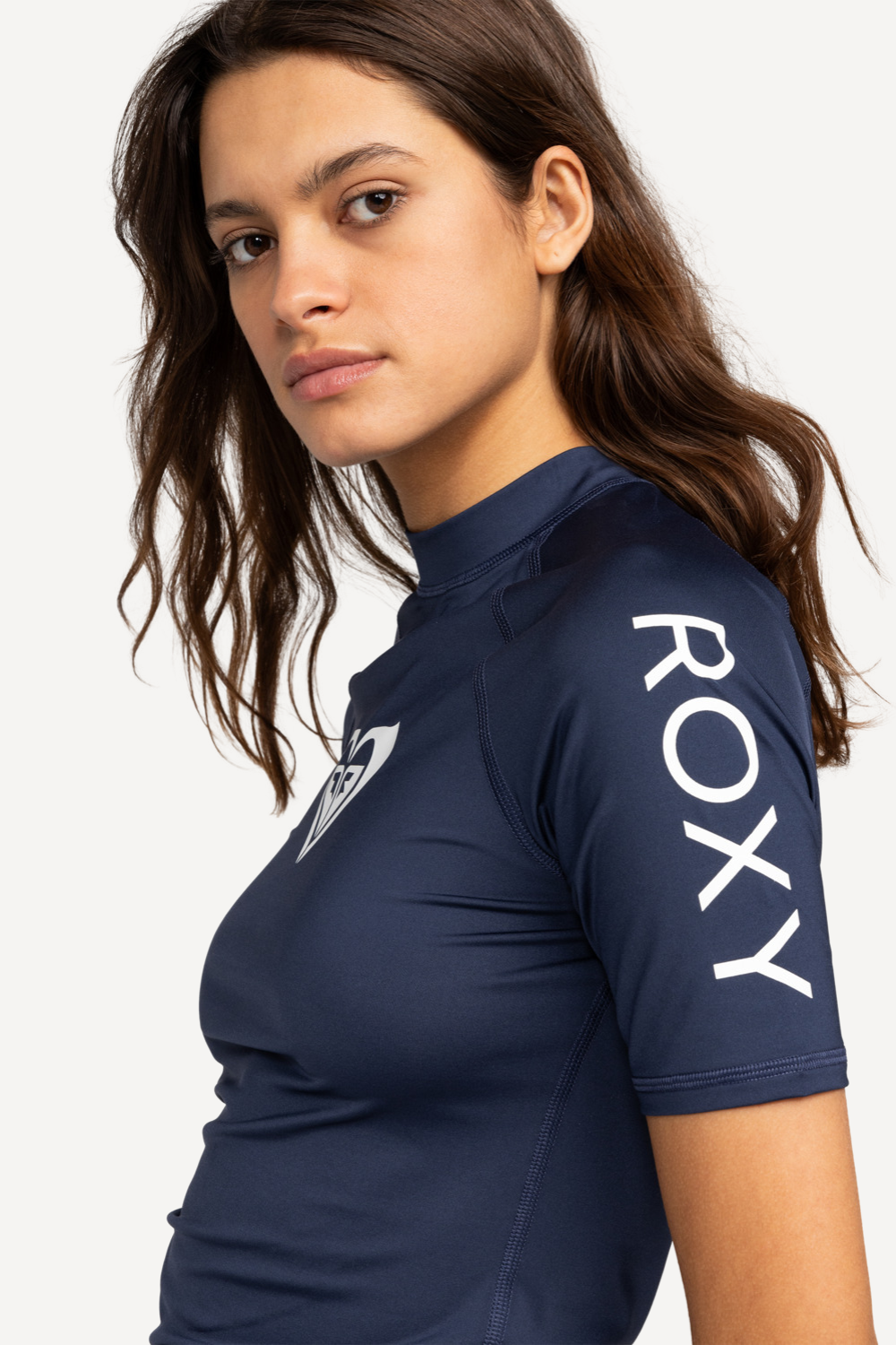 T-shirt de bain anti-UV femme Roxy, manches courtes, bleu marine, UPF 50+, idéal pour le surf et les activités aquatiques.