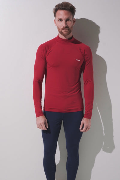 T-shirt de bain anti-UV rouge pour homme, manches longues, léger et UPF 50+ pour activités aquatiques.
