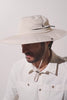 Chapeau anti-UV beige pour homme, léger et confortable, offrant protection solaire UPF50+ lors des activités en extérieur.