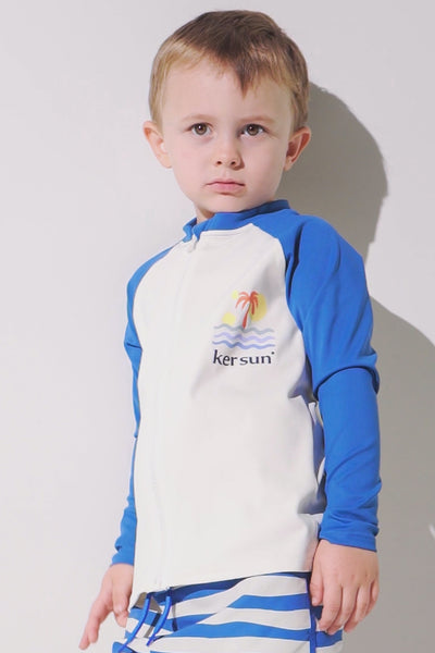 Veste de bain anti-UV - Fidji pour enfant, manches longues, UPF 50+, coloris bleu et blanc, par Ker Sun.